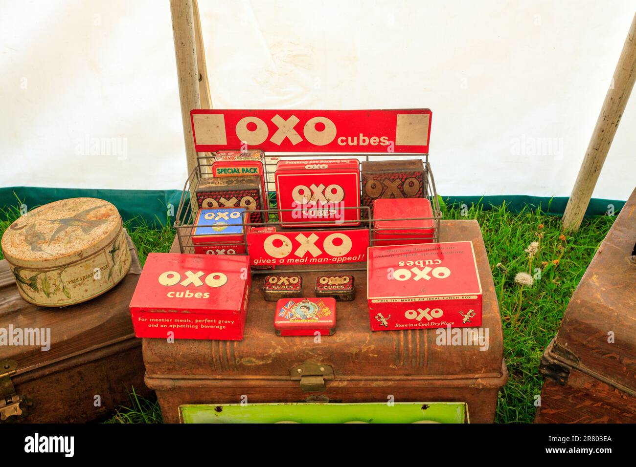 A collection of metal tins that used to contain OXO cubes from various eras at the Abbey Hill Steam Rally, Yeovil, Somerset, England, UK Stock Photo