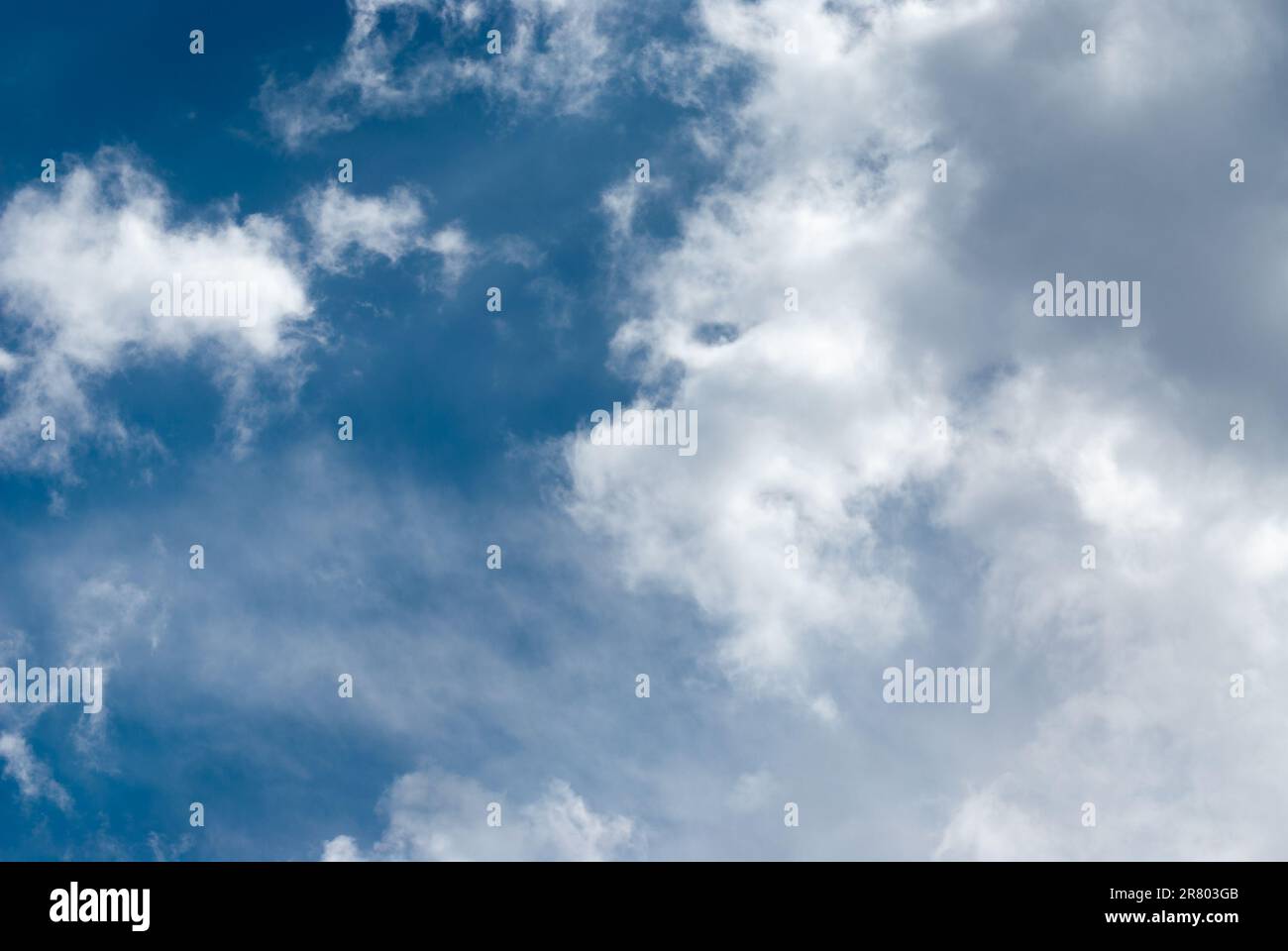 Blue sky background with clouds. Natural background Stock Photo - Alamy