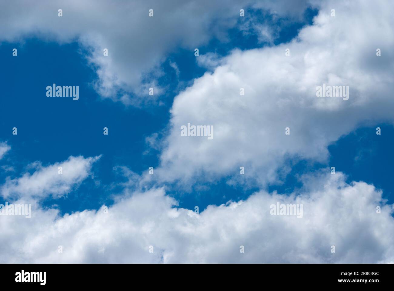 Blue sky background with clouds. Natural background Stock Photo - Alamy
