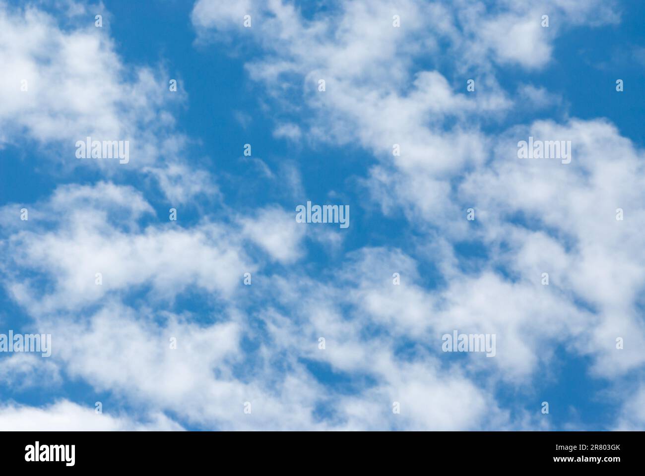 Blue sky background with clouds. Natural background Stock Photo - Alamy