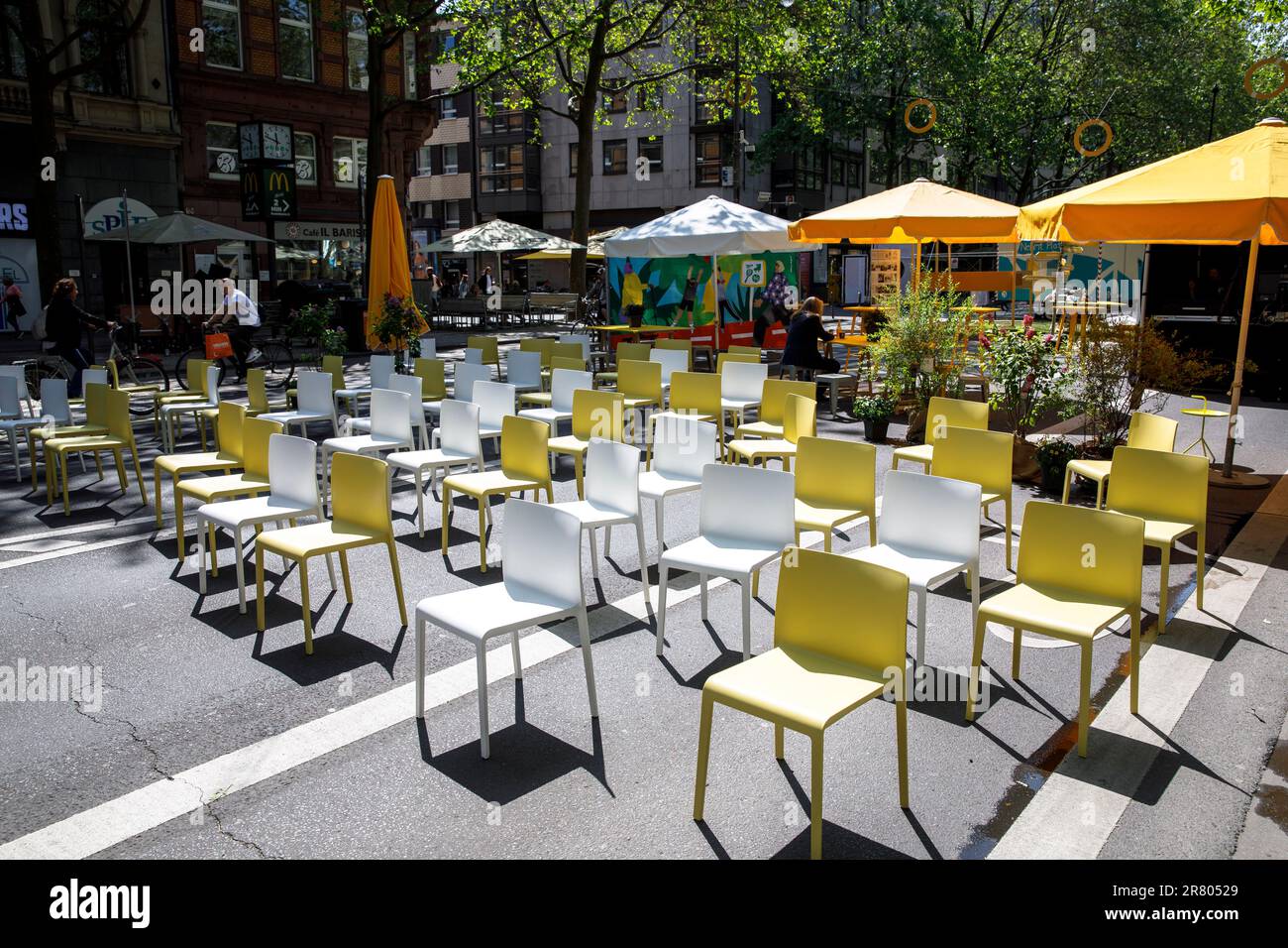 chairs are placed on the Hohenzollernring street in Cologne for an event, Germany. fuer eine Veranstaltung stehen Stuehle auf dem Hohenzollernring in Stock Photo