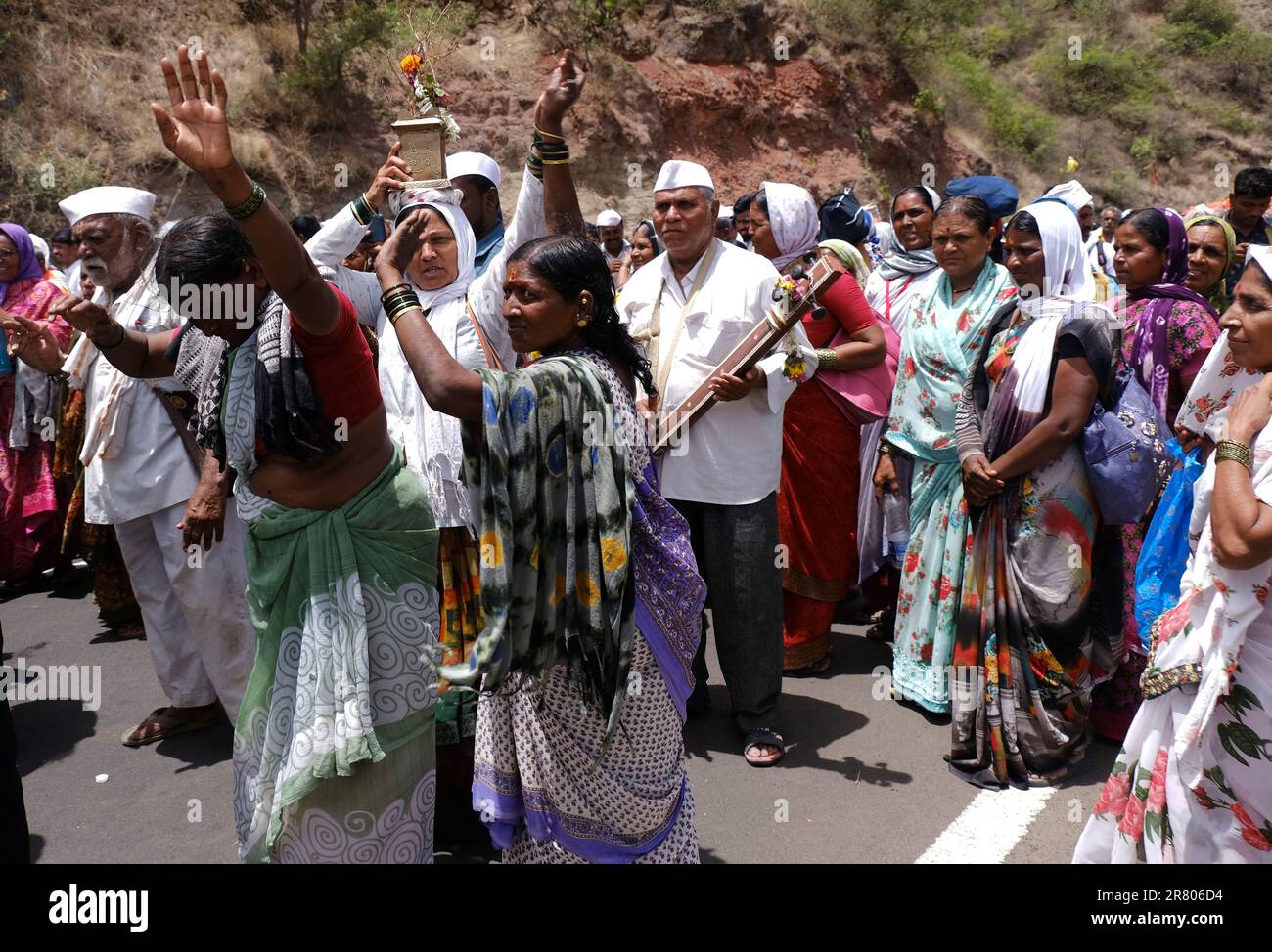 Pune, India 14 July 2023, cheerful Pilgrims at Palkhi, During Pandharpur wari procession Pilgrims marching toward Vitthala temple with singing religio Stock Photo