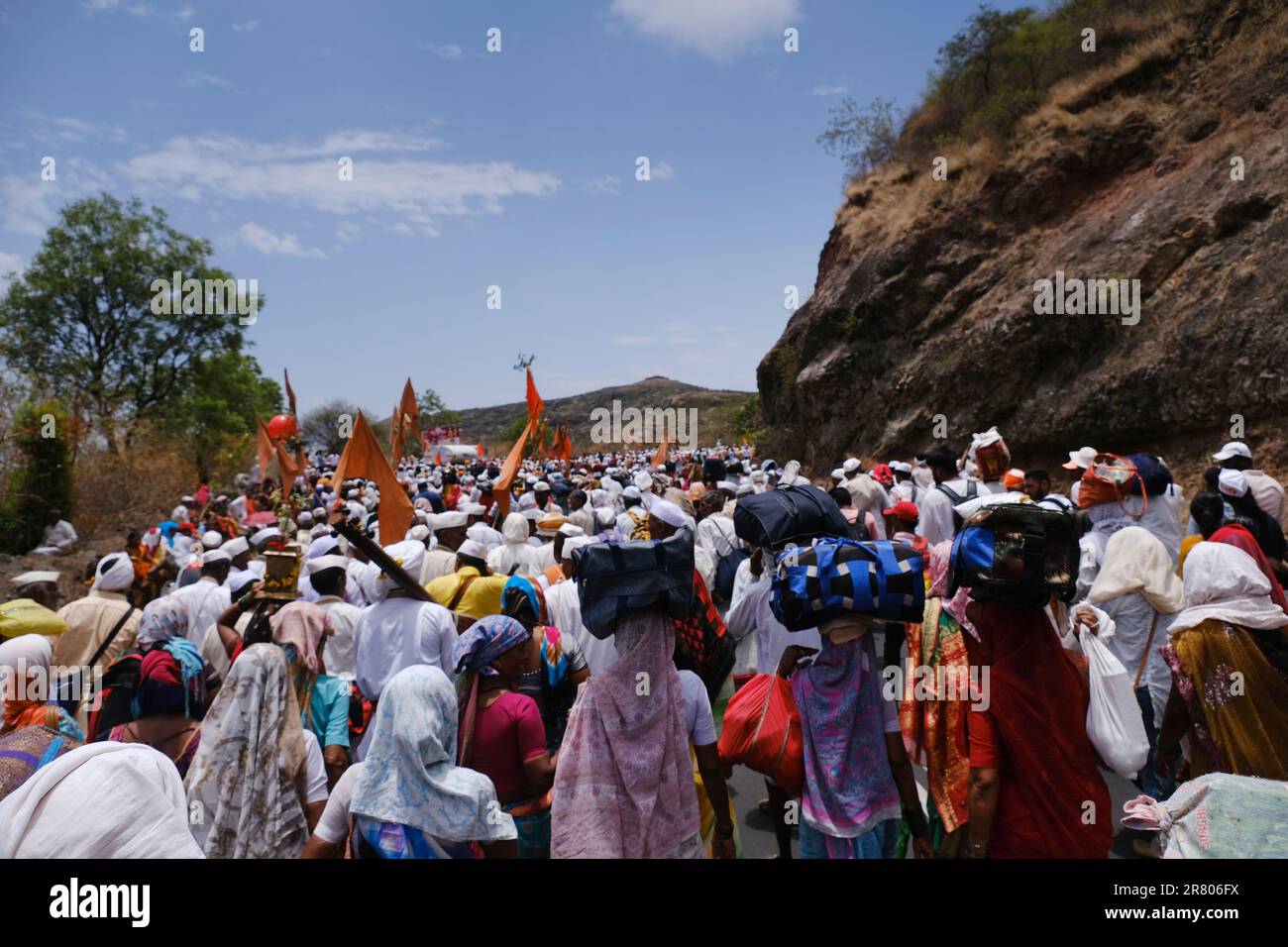 Pune, India 14 July 2023, cheerful Pilgrims at Palkhi, During Pandharpur wari procession Pilgrims marching toward Vitthala temple with singing religio Stock Photo