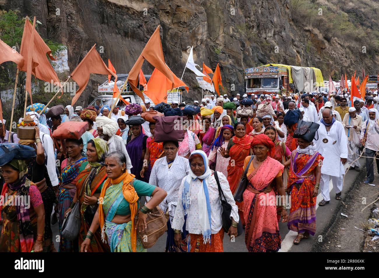 Pune, India 14 July 2023, cheerful Pilgrims at Palkhi, During Pandharpur wari procession Pilgrims marching toward Vitthala temple with singing religio Stock Photo