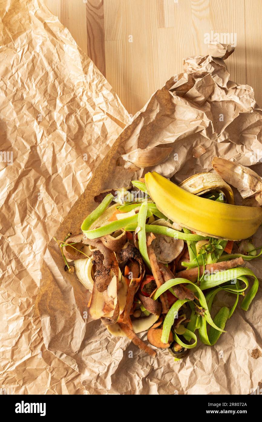Food organic waste on eco friendly parchment paper, fruit and vegetable