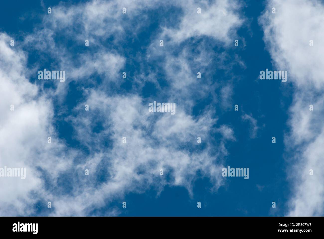 Blue sky background with clouds. Natural background Stock Photo - Alamy