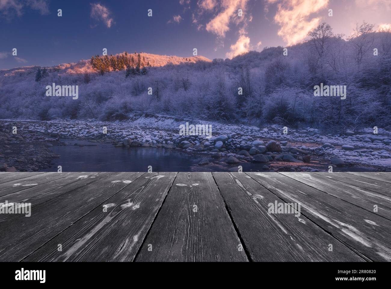 mountain river flowing with empty wooden batten bridge. Natural ...