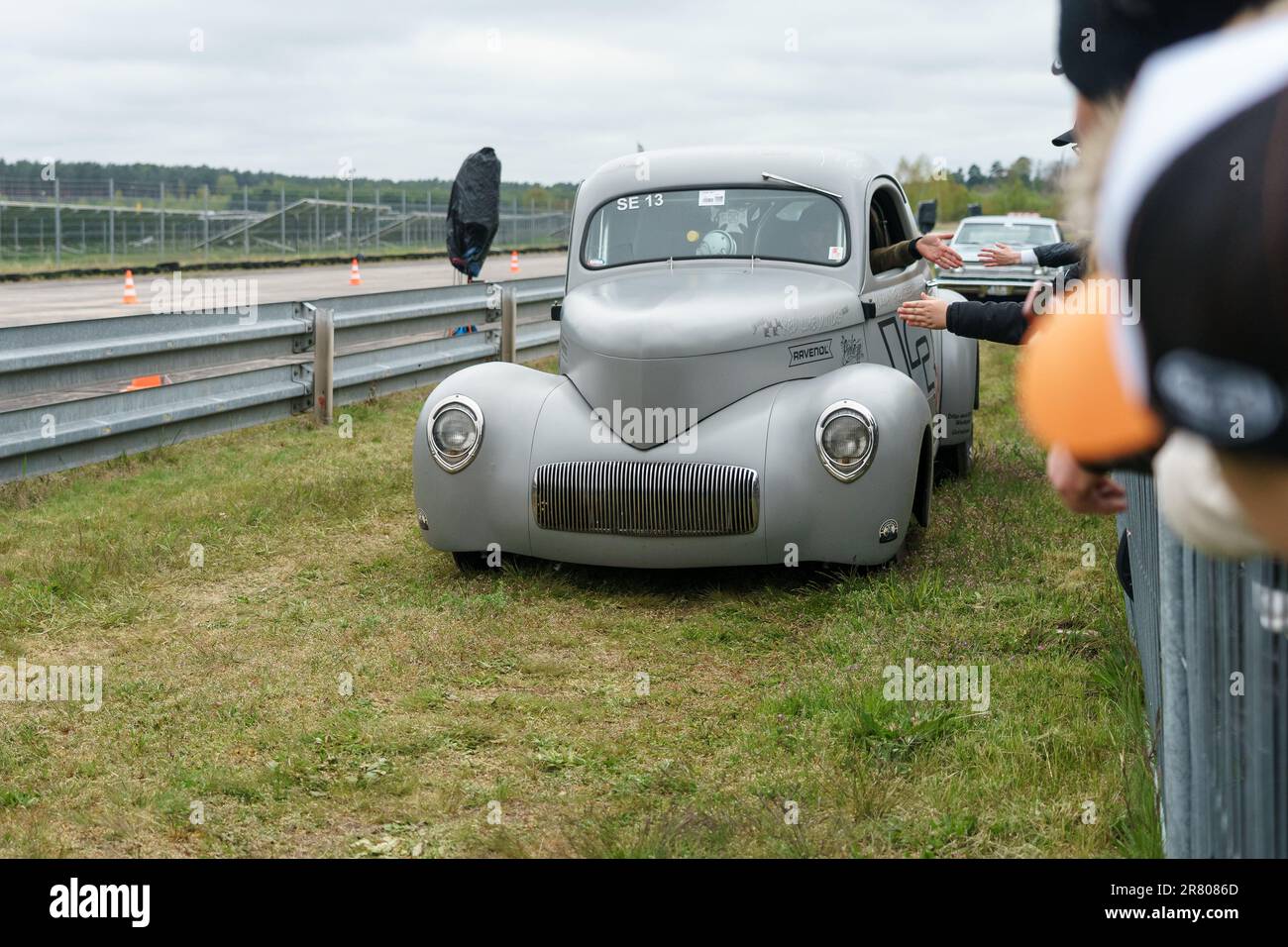 FINOWFURT, GERMANY - MAY 06, 2023: The hotrod 1941 Willys Coupe by Micha 'Fullspeed' Vogt on the road. Race festival 2023. Season opening. Stock Photo
