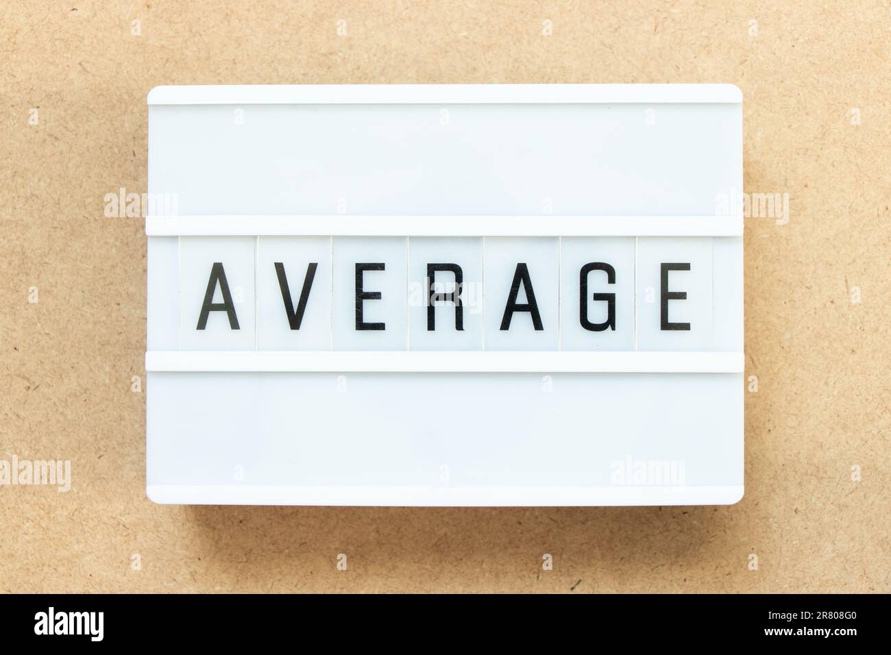 Lightbox with word average on wood background Stock Photo