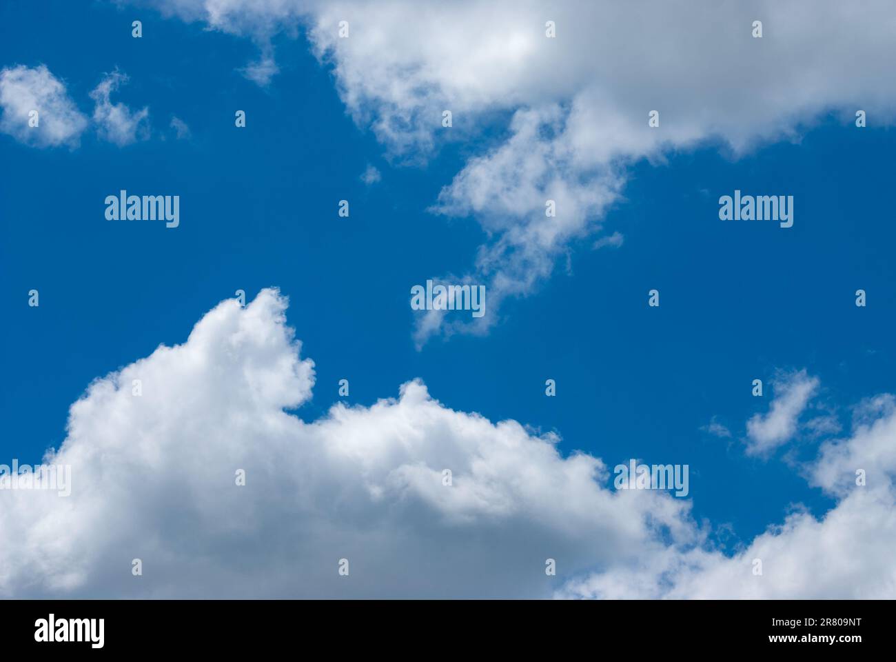 Blue sky background with clouds. Natural background Stock Photo - Alamy