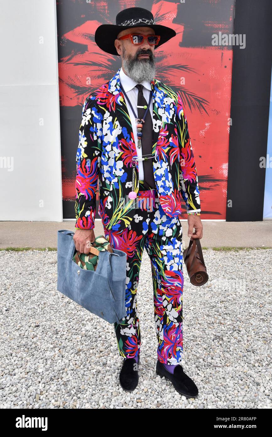 Florence, Italy. 13th June, 2023. Street style at Pitti Immagine Uomo in  Florence, Italy on June 13 2023. Fashionable colorful men posing in street  around Pitti Immagine Uomo exibition at Fortezza da