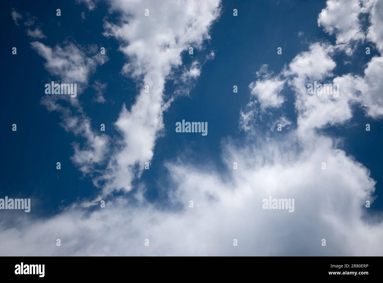 Blue sky background with clouds. Natural background Stock Photo - Alamy