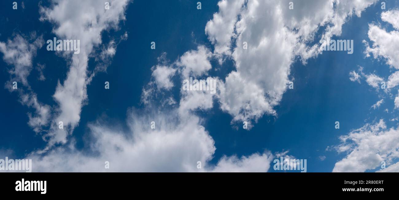 Blue sky background with clouds. Natural background Stock Photo - Alamy
