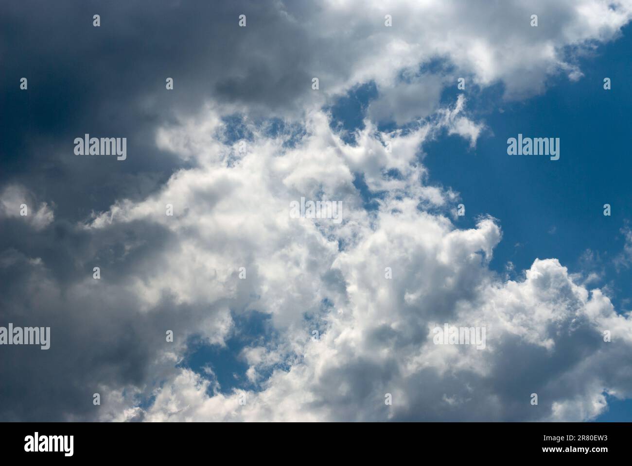 Blue sky background with clouds. Natural background Stock Photo - Alamy