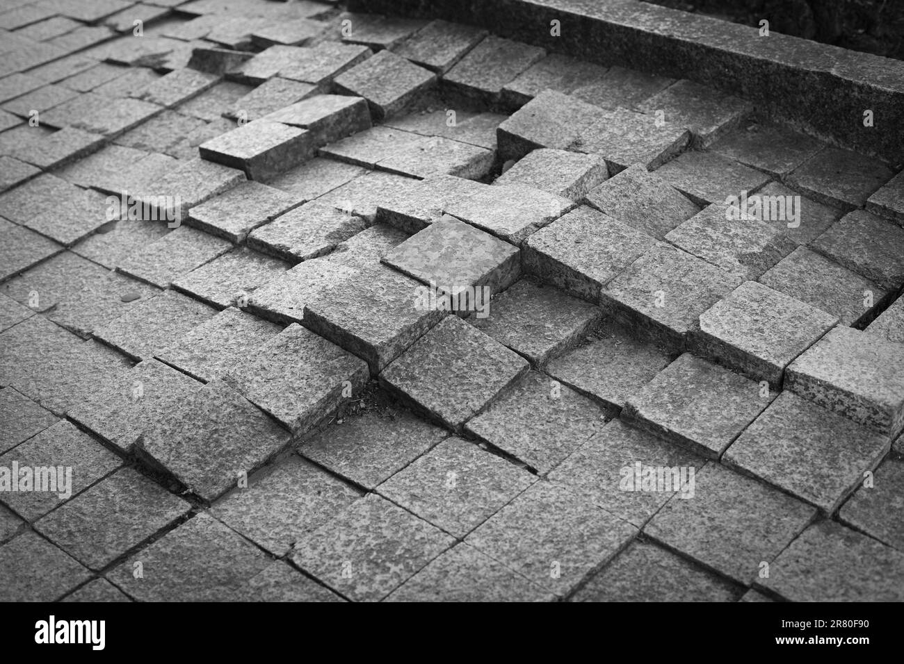 Sidewalk lifted by tree root Stock Photo - Alamy