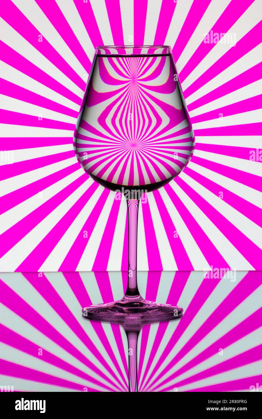 Pattern distortions seen through a glass of water. Still life Stock ...