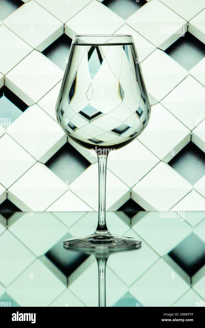 Pattern distortions seen through a glass of water. Still life Stock ...