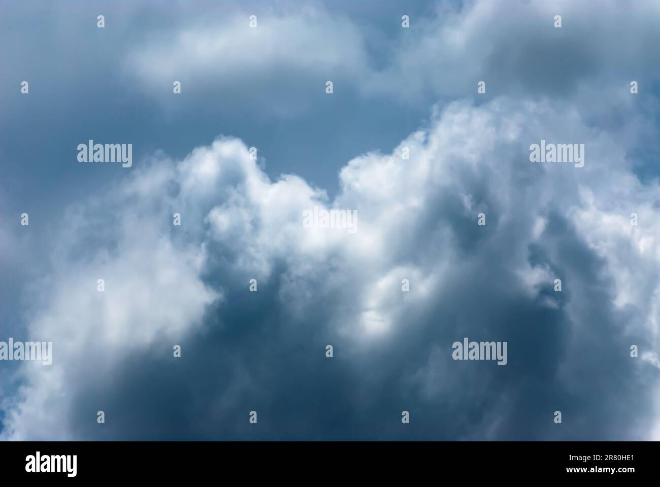 Blue sky background with clouds. Natural background Stock Photo - Alamy