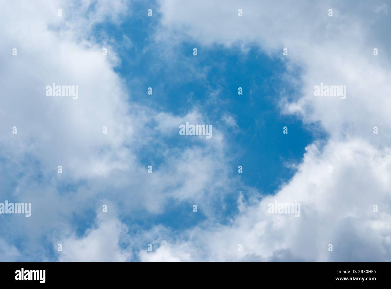 Blue sky background with clouds. Natural background Stock Photo - Alamy
