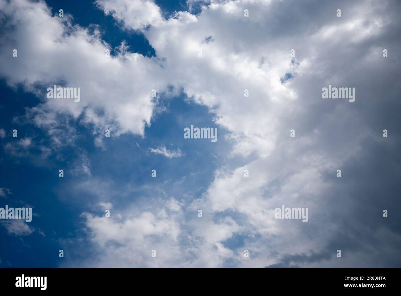 Blue sky background with clouds. Natural background Stock Photo - Alamy