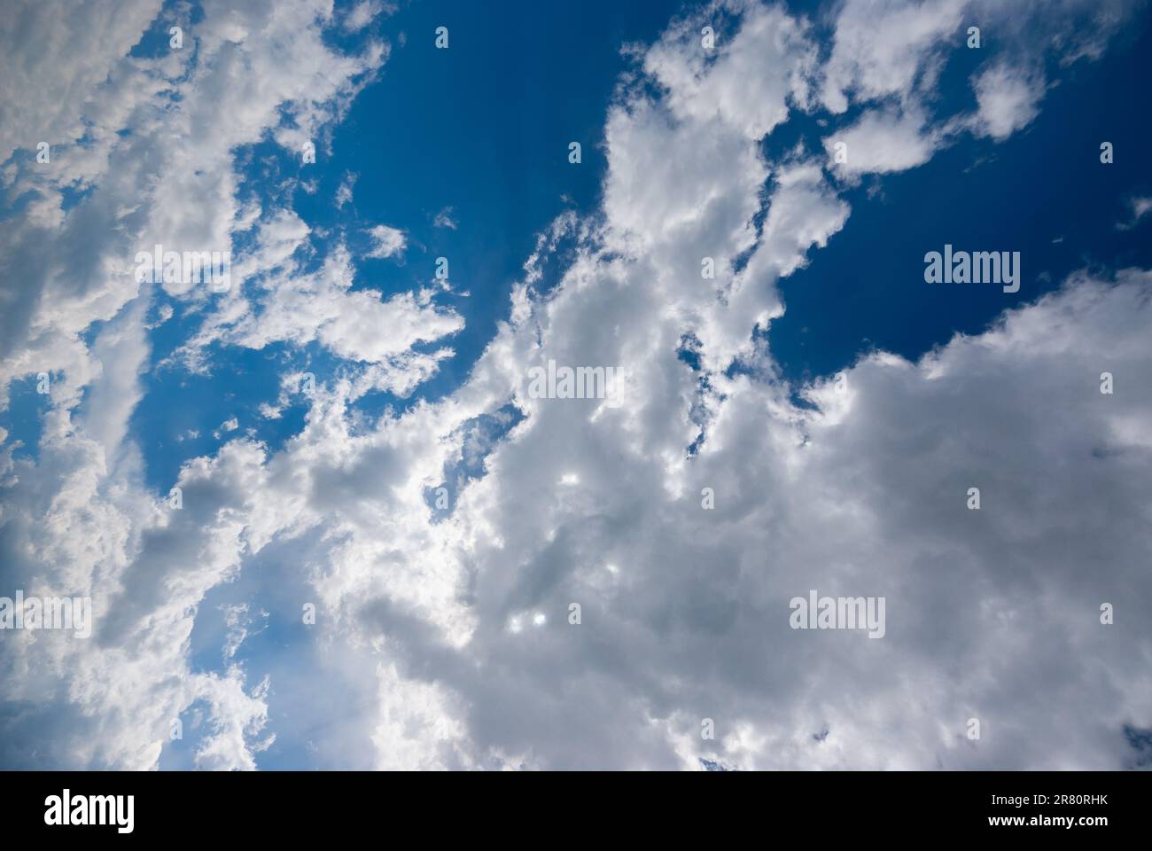 Blue sky background with clouds. Natural background Stock Photo - Alamy