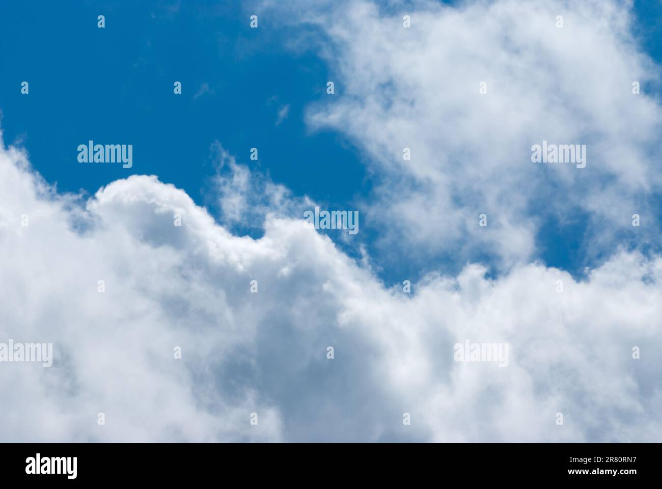Blue sky background with clouds. Natural background Stock Photo - Alamy