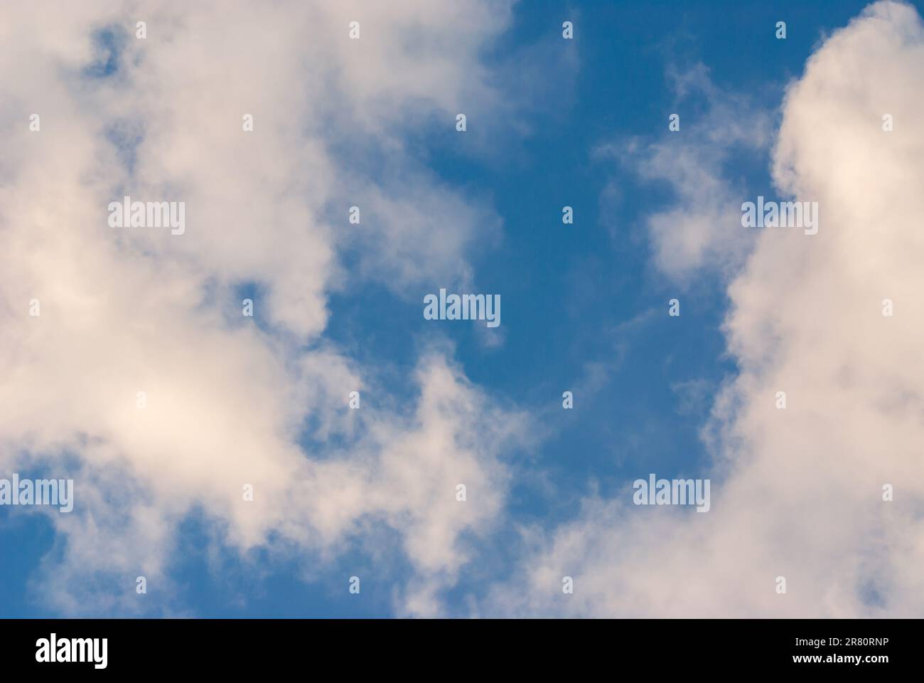 Blue sky background with clouds. Natural background Stock Photo - Alamy