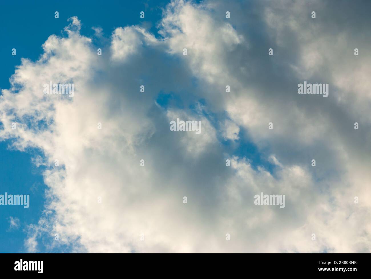 Blue sky background with clouds. Natural background Stock Photo - Alamy