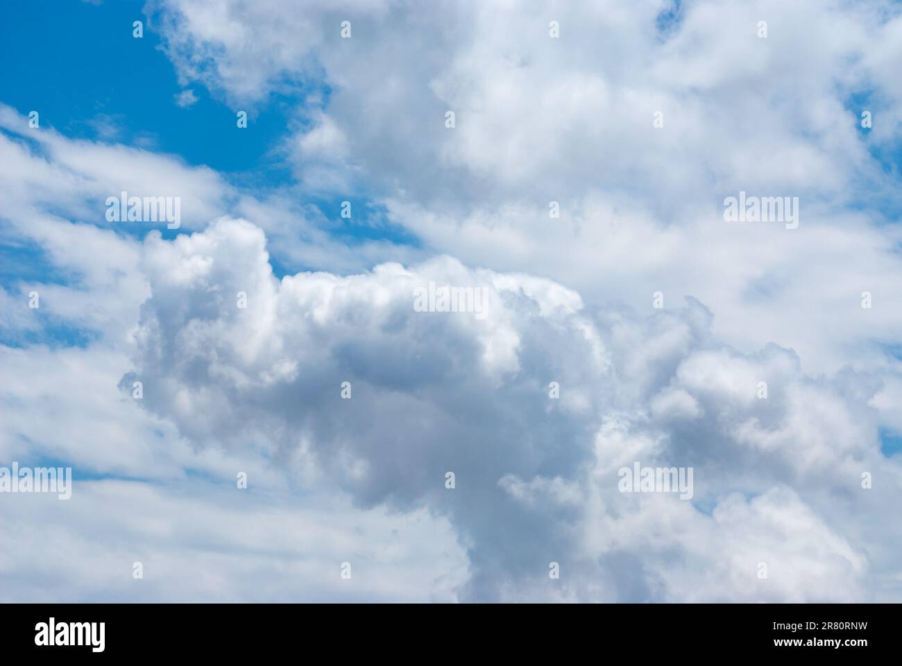Blue sky background with clouds. Natural background Stock Photo - Alamy