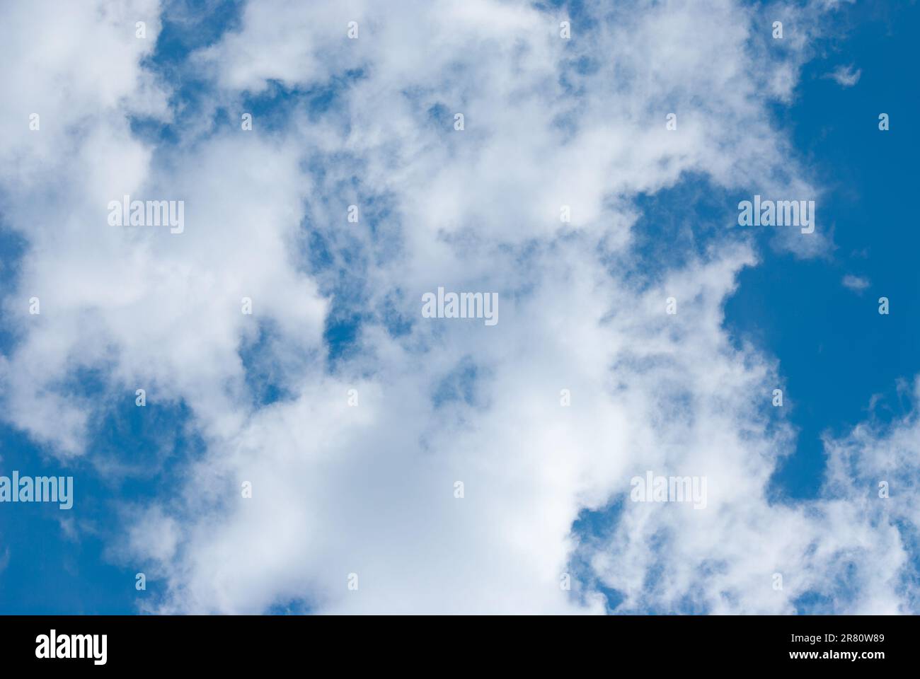 Blue sky background with clouds. Natural background Stock Photo - Alamy