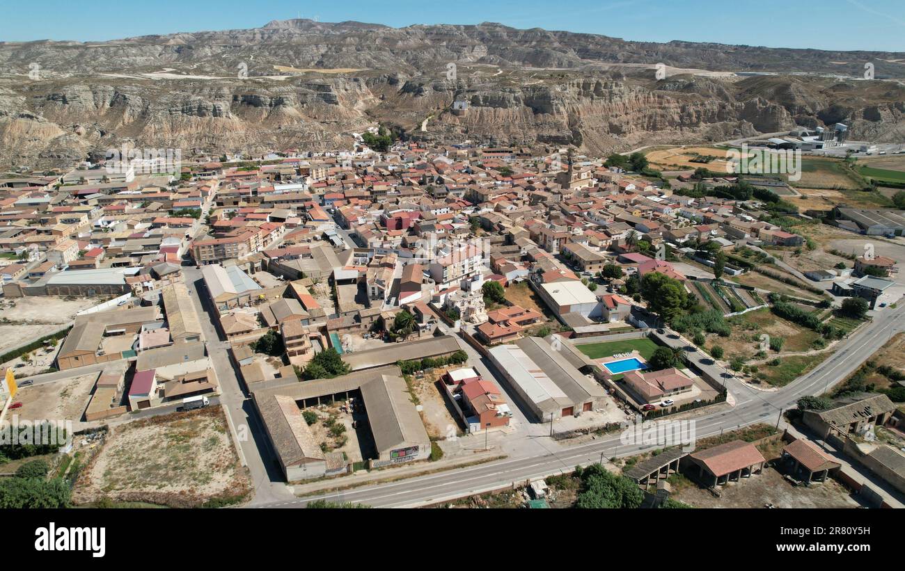Aerial view of the town of Remolinos, Zaragoza, Spain, with the surrounding mountains in the background Stock Photo