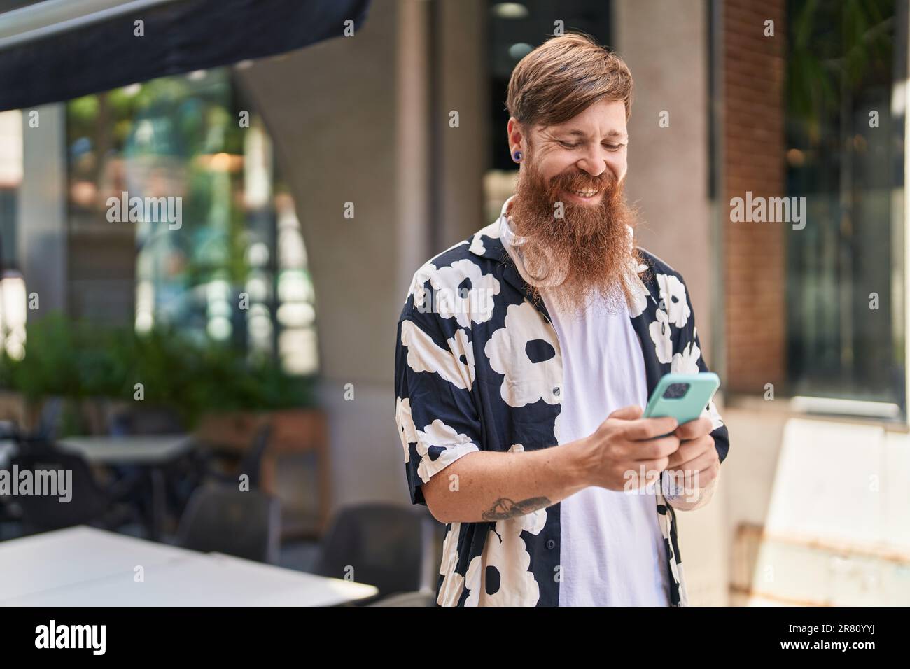 Confident redhead man using hi-res stock photography and images - Alamy