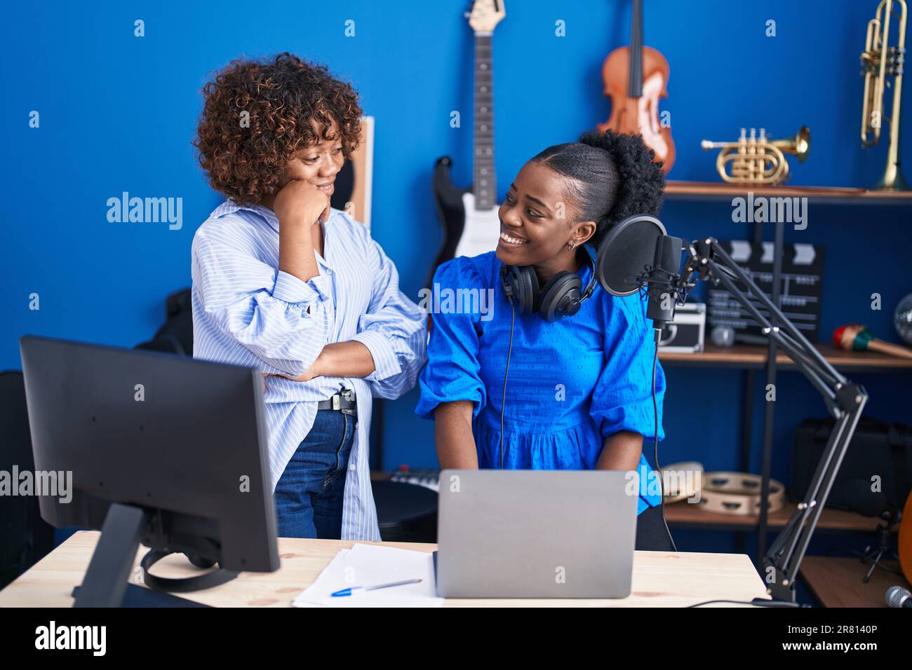 African american female composer using hi-res stock photography and ...