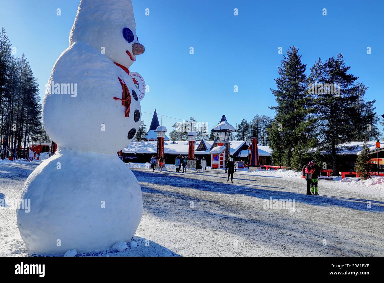 Santa Claus Village, Arctic Circle, Rovaniemi, Lapland, Finland - Winter scene with snow and giant snowman at the Father Christmas theme park Stock Photo