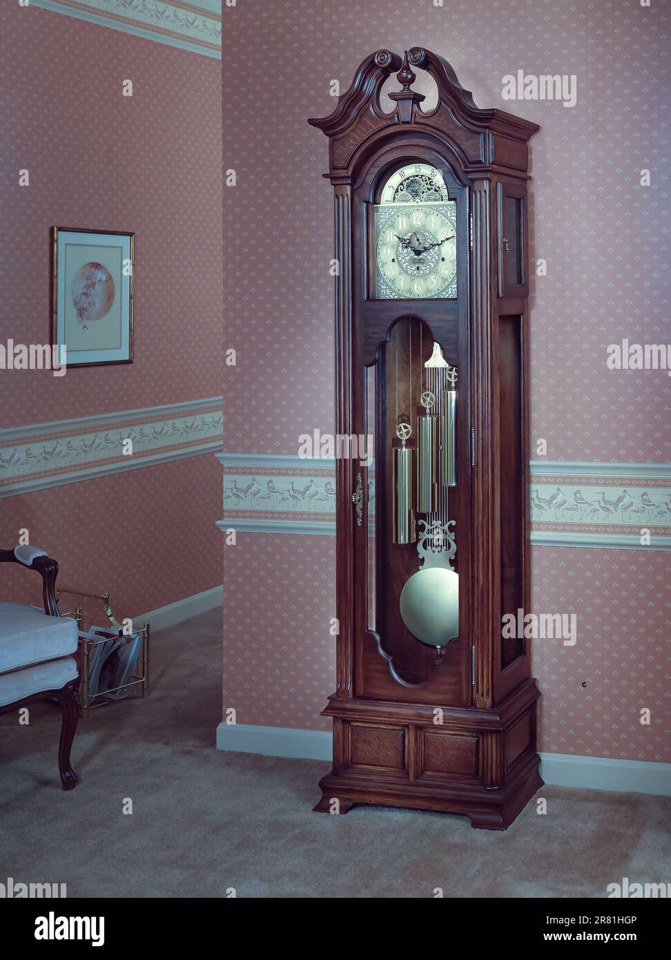 Grandfather clock in entrance hallway of house Stock Photo Alamy