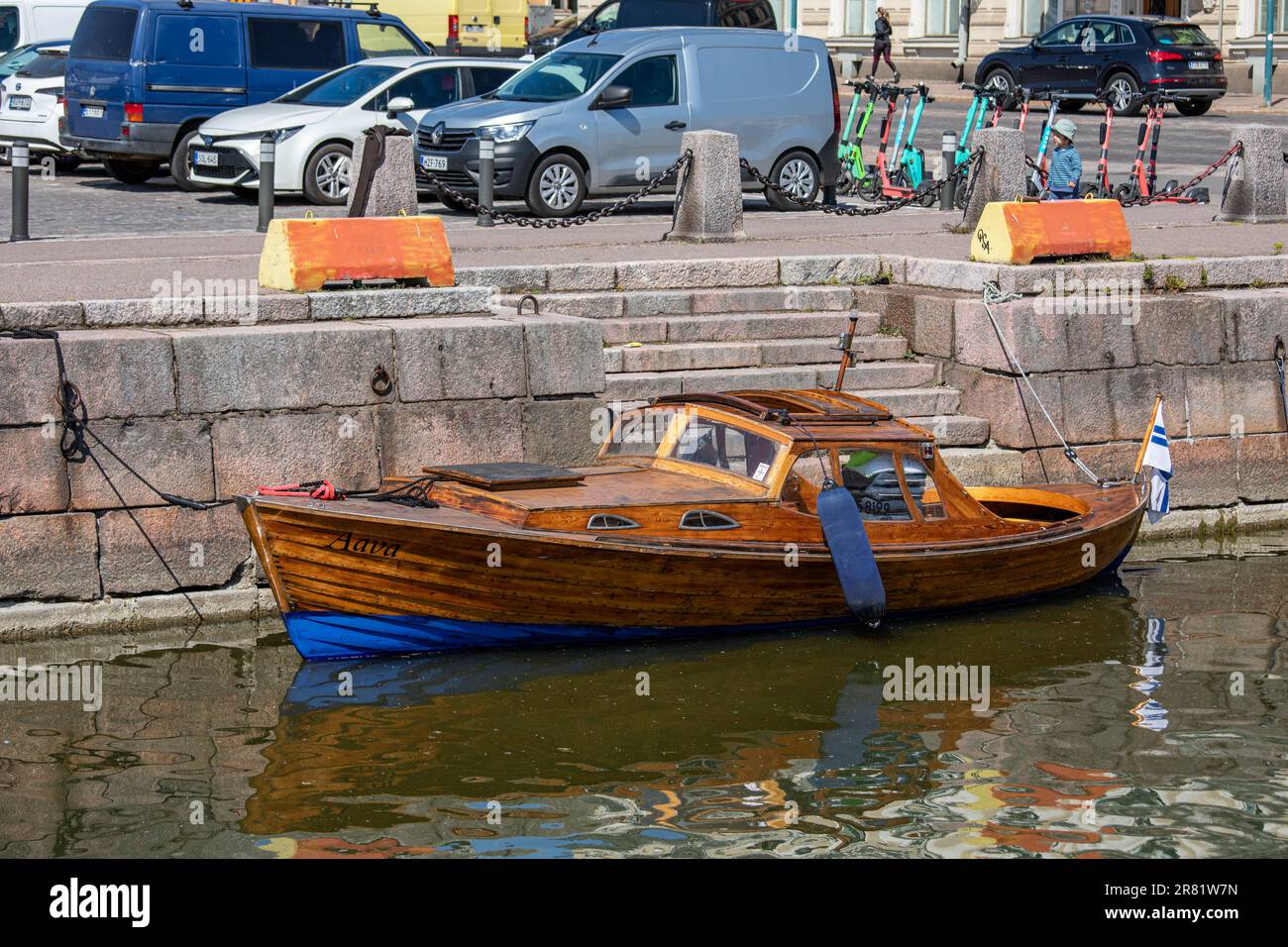 Old wooden motorboat named Aava moored by Market Square in Helsinki, Finland Stock Photo