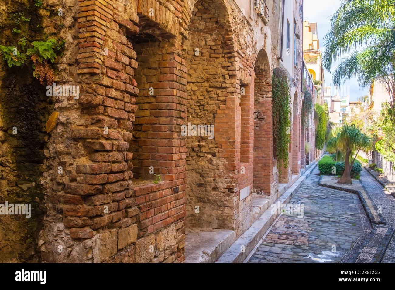 Naumachia or Naumachie of Taormina is ruins of ancient brick wall in Taormina old town on Sicily island, Italy Stock Photo