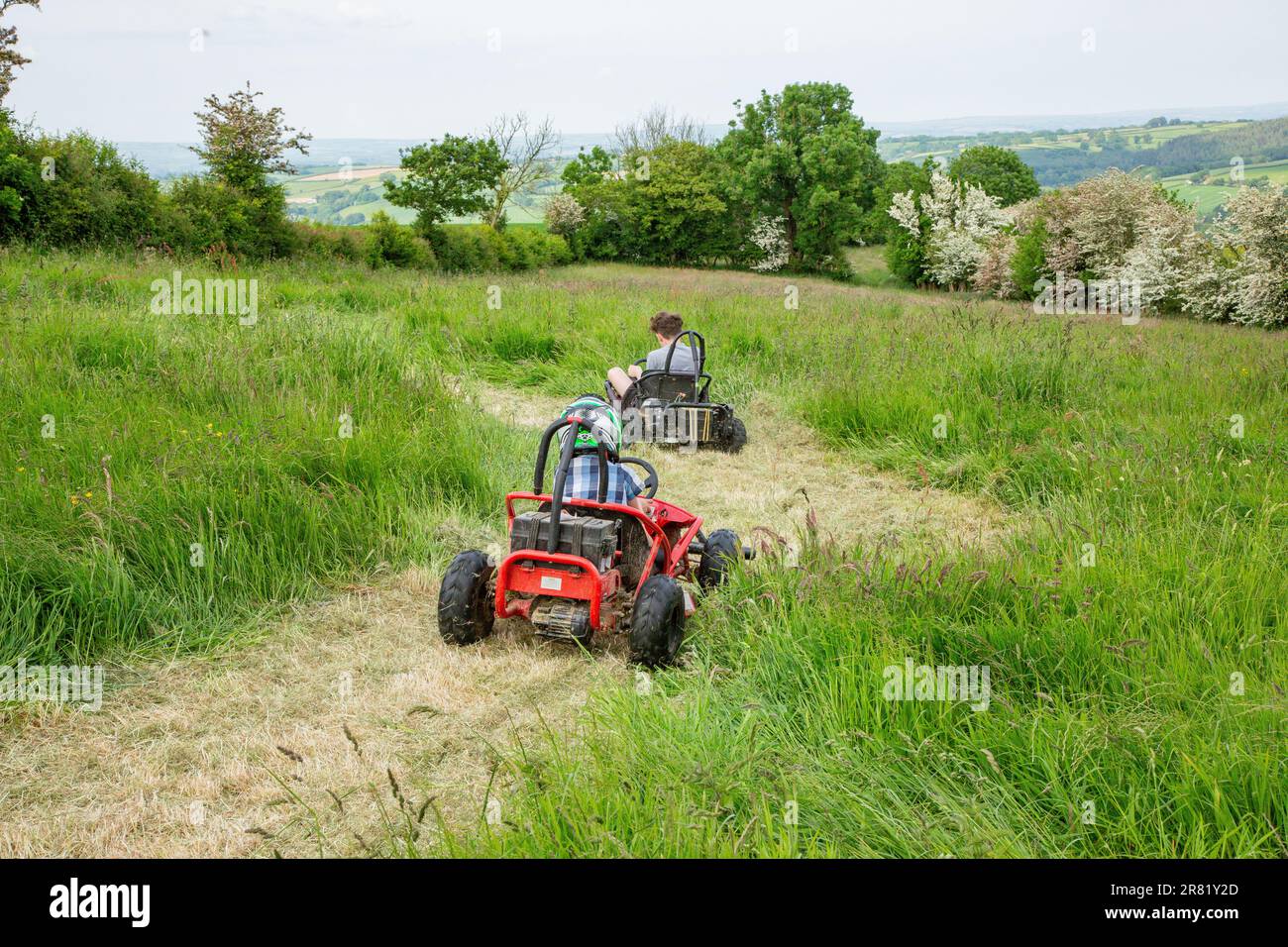 Electric powered GoKart racing around a field, High Bickington, North Devon, England, United