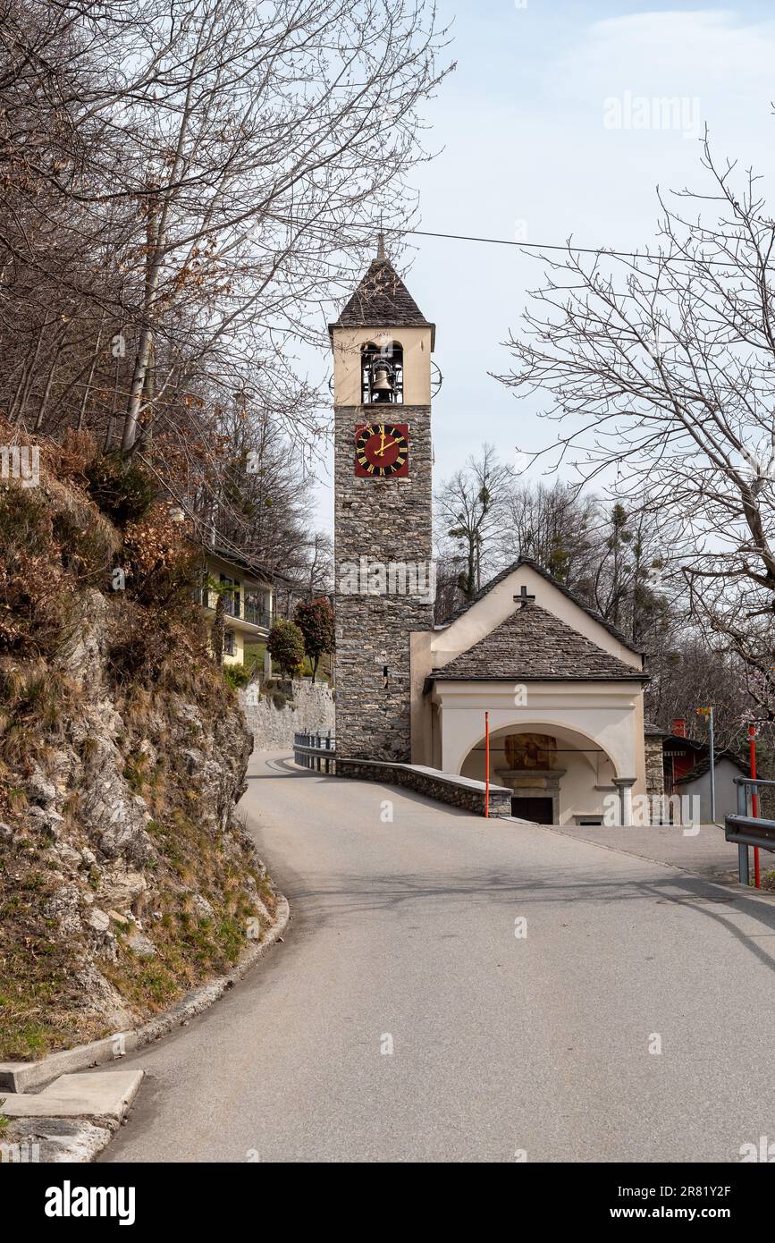 View of the San Lorenzo church between Camedo and Borgnone on the Centovalli road, Ticino, Switzerland Stock Photo