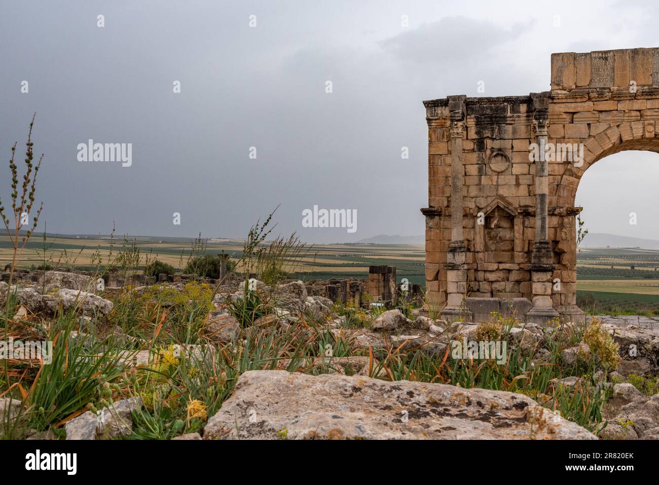 Iconic Triumphal Arch of Volubilis, an old ancient Roman city in Morocco, North Africa Stock Photo