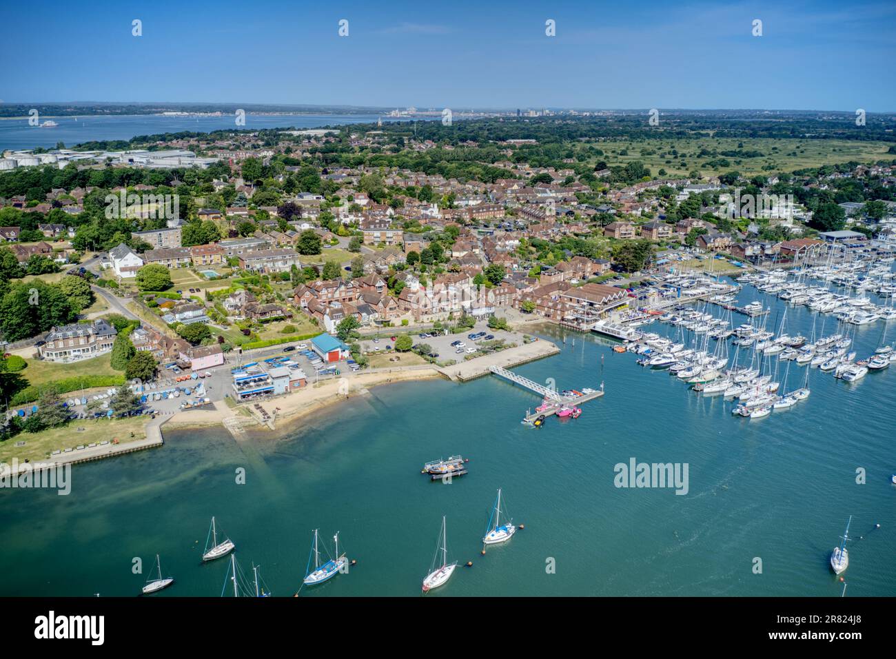Hamble Le Rice known as Hamble Village on The Hamble River, a popular yachting destination with Port Hamble Marina full of Sailing Boats, Aerial view. Stock Photo