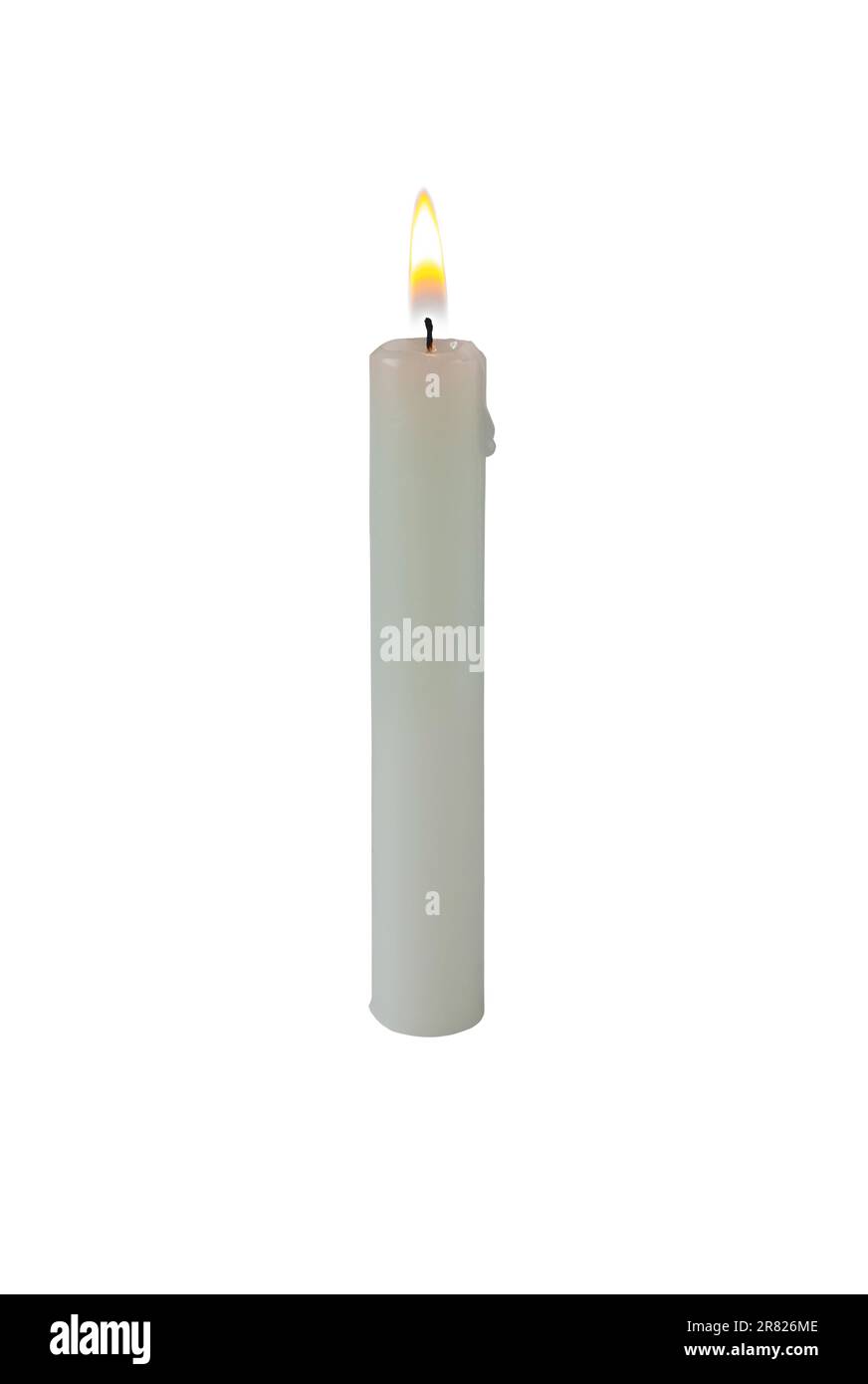 Burning candle made of white paraffin wax isolated on white. Bright