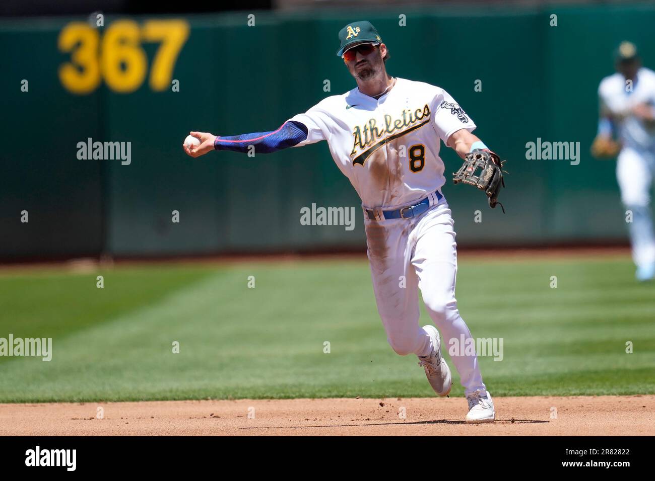 Oakland Athletics' Tyler Wade throws out Philadelphia Phillies' Josh  Harrison at first base during the fourth inning of a baseball game in  Oakland, Calif., Sunday, June 18, 2023. (AP Photo/Jeff Chiu Stock