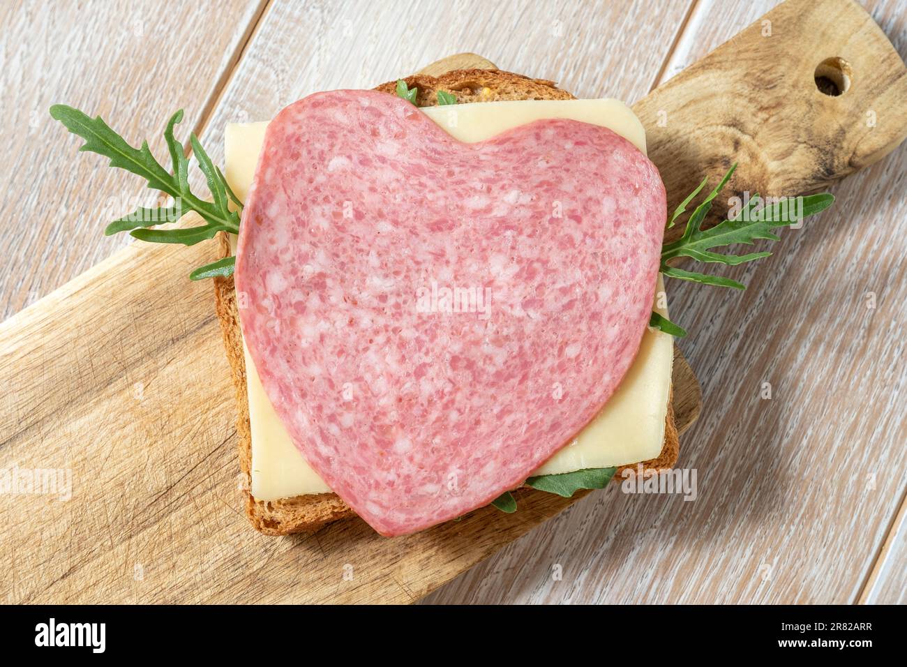 Heart shape sandwich with salami and cheese Stock Photo Alamy
