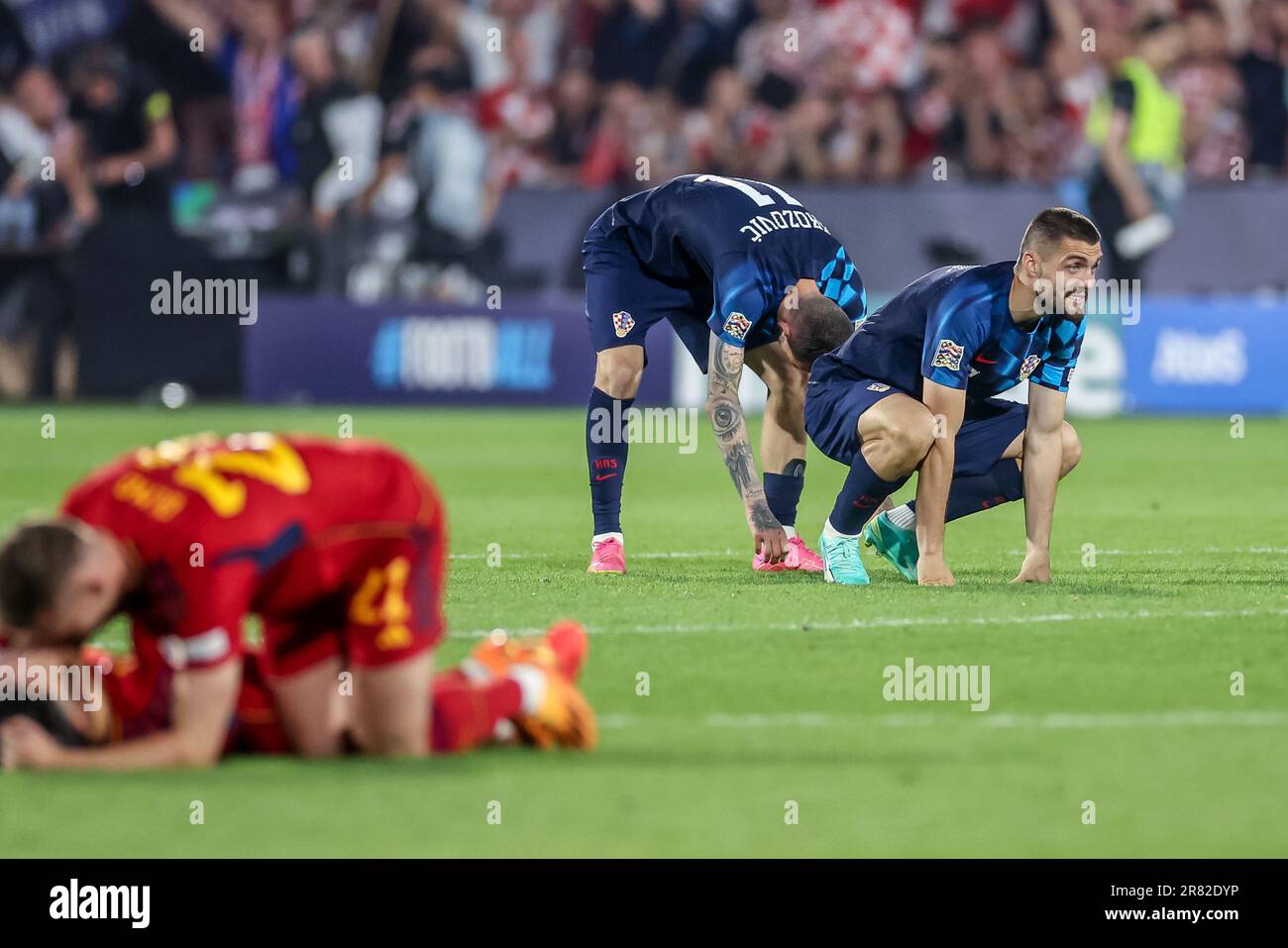 Rotterdam, Netherlands. 18th June, 2023. ROTTERDAM, NETHERLANDS - JUNE 18: Marcelo Brozovic of Croatia and Bruno Petkovic of Croatia are disappointed about the lose during the UEFA Nations League Final match between Croatia and Spain at Stadion Feijenoord de Kuip on June 18, 2023 in Rotterdam, Netherlands (Photo by Henk Jan Dijks/ Orange Pictures) Credit: Orange Pics BV/Alamy Live News Stock Photo