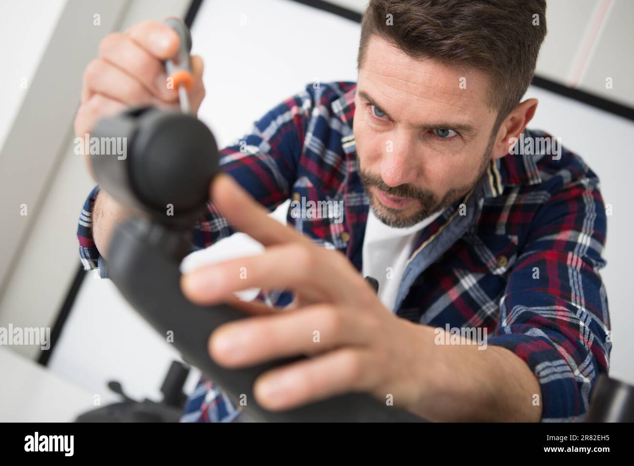 an office chair wheel assembly Stock Photo Alamy