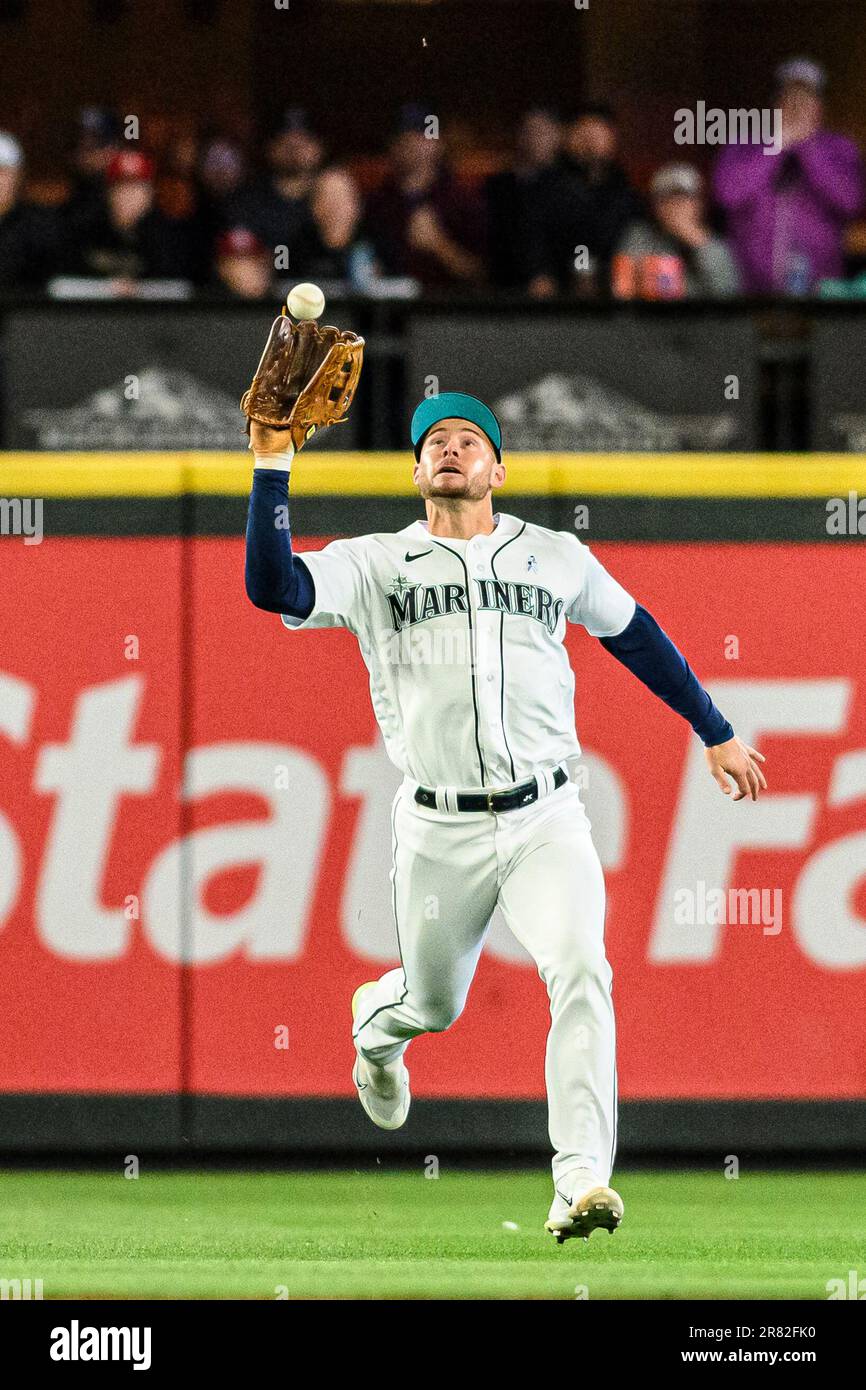 Seattle Mariners left fielder Jarred Kelenic catches a fly ball hit by Chicago White Sox's Elvis