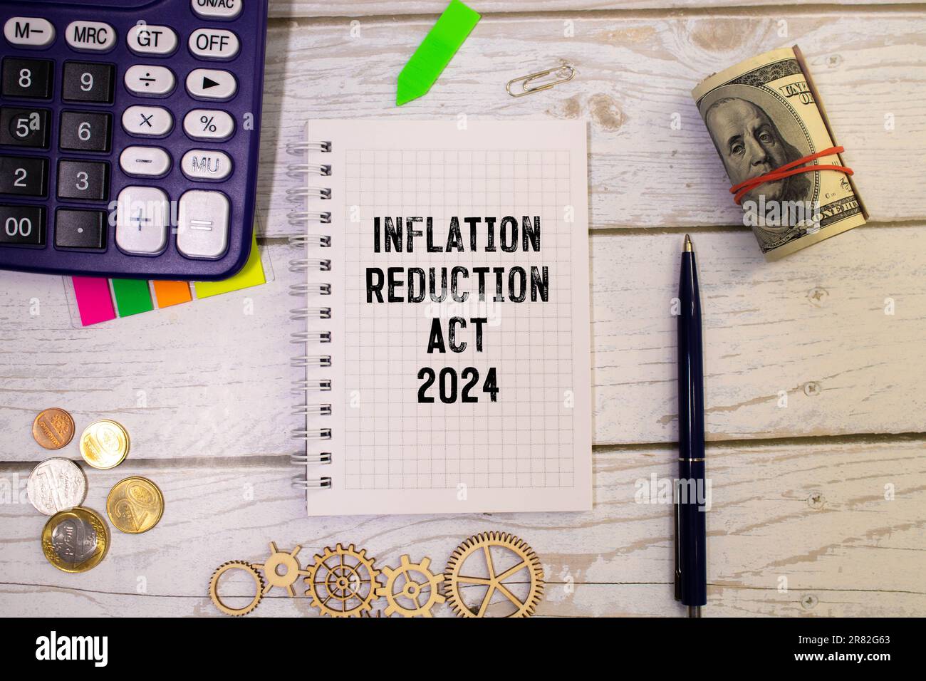 On the table charts, calculator and notebook with the INFLATION