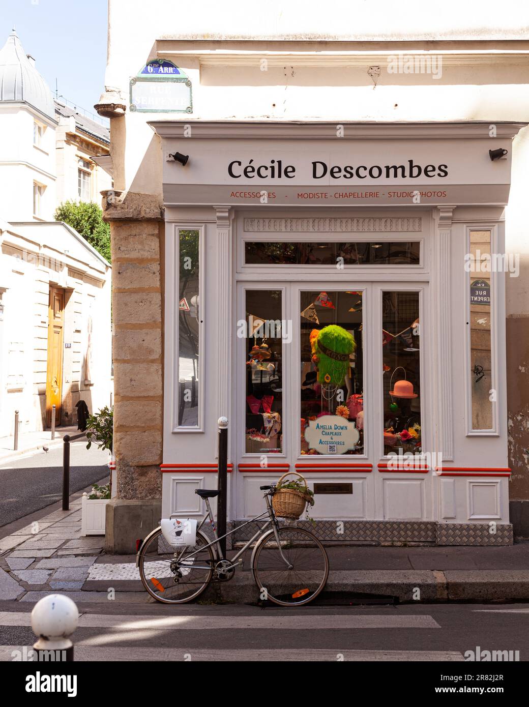 Paris, France - July, 15: Window of the accessories shop Cécile Descombes in the typical french street with shops on the first floor in house. Vintage Stock Photo