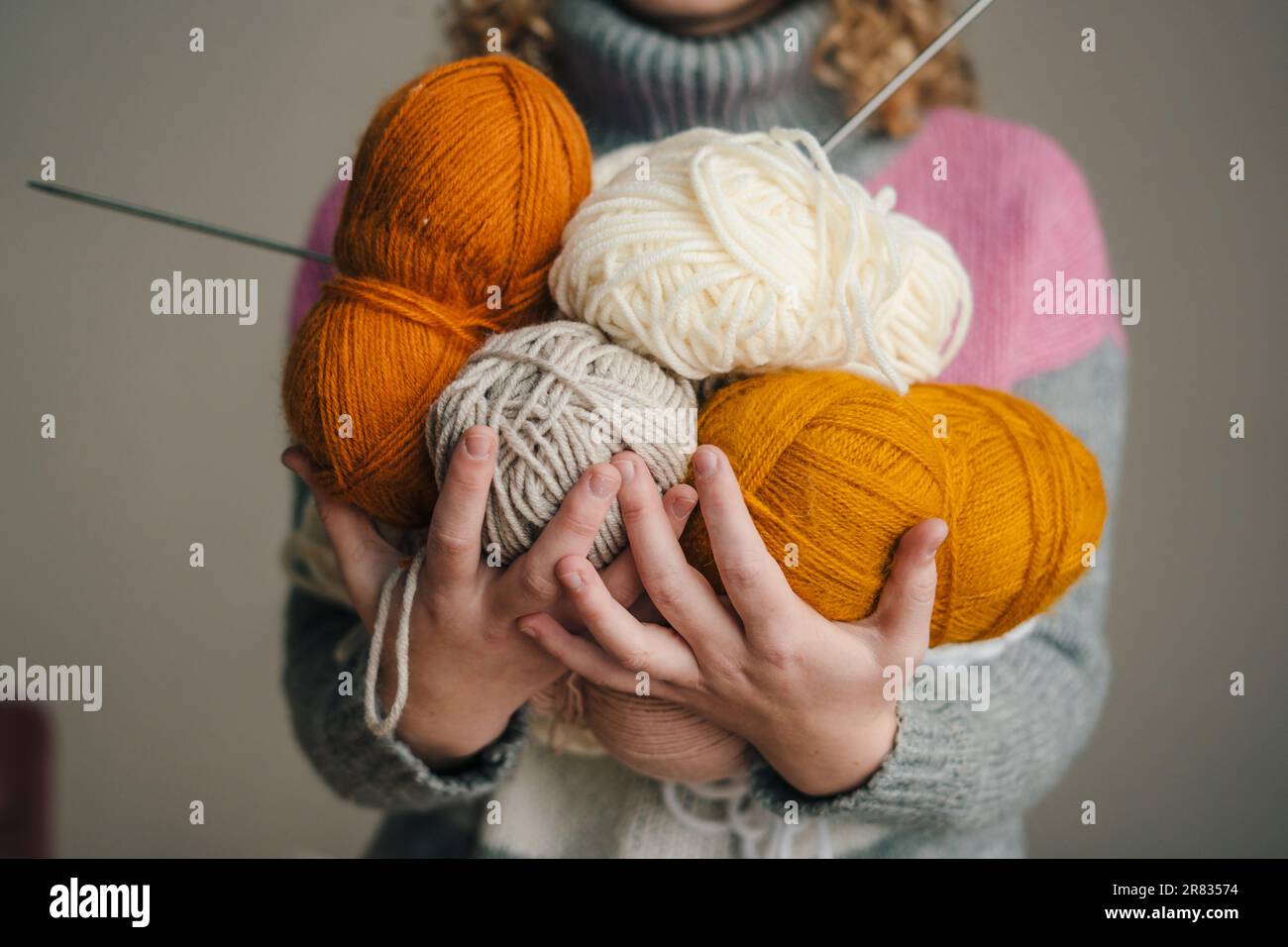 Woman's Hand Holds Large Knitting Needles Knitted Yarn Large Skein Stock  Photo by ©dalivl@yandex.ru 396078754